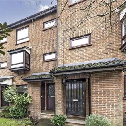 Buy this 4 bed townhouse on Cadogan Road in London, KT6 4DJ