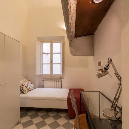 Rent this 4 bed room on Enoteca Bruni in Borgo Ognissanti 25/r, 50123 Florence FI
