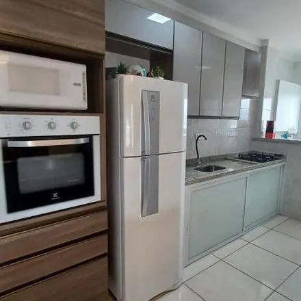 Buy this 2 bed apartment on Rua Colômbia 395 in Guilhermina, Praia Grande - SP