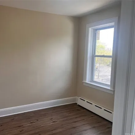 Rent this 3 bed apartment on 65-04 Hull Avenue in New York, NY 11378