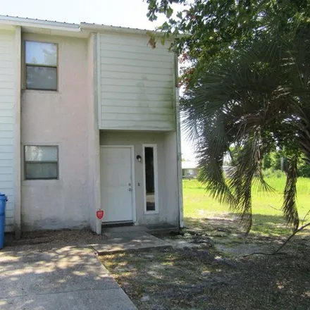 Rent this 2 bed townhouse on 5408 Manzonita Drive in Callaway, FL 32404