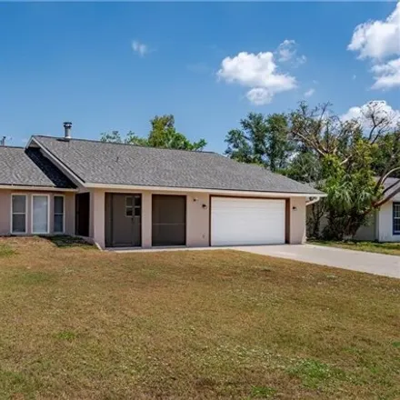 Buy this 3 bed house on 1477 Southeast 25th Lane in Cape Coral, FL 33904