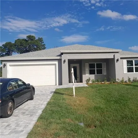 Buy this 4 bed house on 1845 Southwest Mackenzie Street in Port Saint Lucie, FL 34953