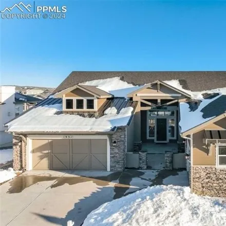 Buy this 5 bed house on 1939 Walnut Creek Court in Colorado Springs, CO 80921