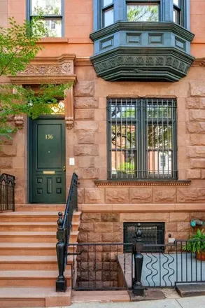 Buy this 5 bed townhouse on 136 Manhattan Avenue in New York, NY 10025