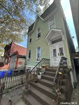 Buy this 7 bed house on 1718 Decatur Street in New York, NY 11385