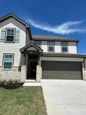 Rent this 4 bed house on Brooks Ranch Drive in Kyle, TX 78640
