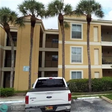 Buy this 2 bed condo on Riverside Drive in Coral Springs, FL 33071