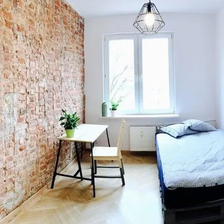 Rent this 4 bed room on Żytnia 75/77 in 01-149 Warsaw, Poland