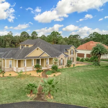 Buy this 6 bed house on 96082 Scarlet Oaks Court in Yulee, FL 32097