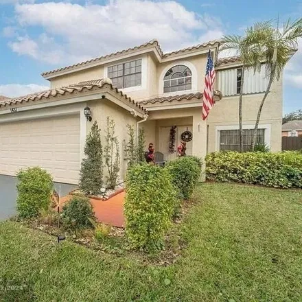 Rent this 4 bed house on 1449 Southwest 87th Way in Pembroke Pines, FL 33025