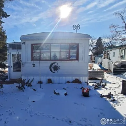 Buy this studio apartment on 221 W 57th St Lot A49 in Loveland, Colorado