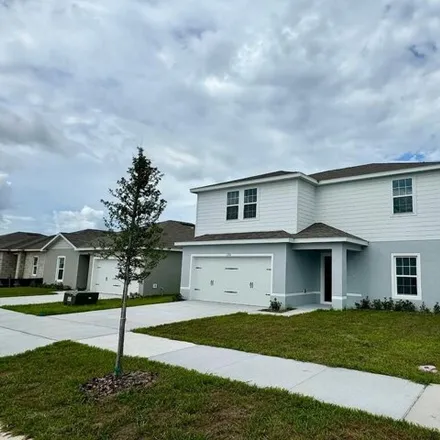 Rent this 4 bed house on 1594 Finnigan Cir in Haines City, Florida