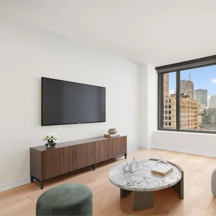 Rent this studio apartment on 117 Varick Street in New York, NY 10013