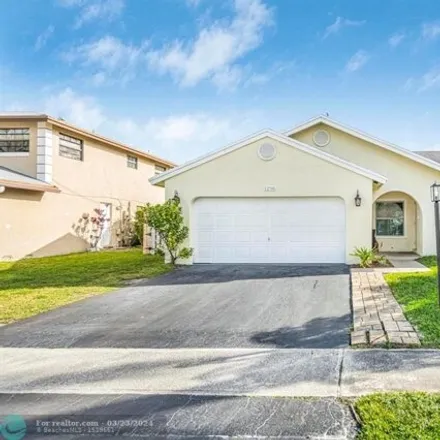 Rent this 3 bed house on 1290 Southwest 151st Avenue in Sunrise, FL 33326