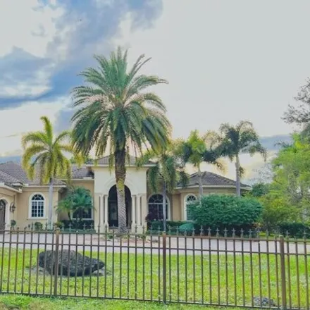 Buy this 6 bed house on 4379 Northwest 101st Drive in Coral Springs, FL 33065