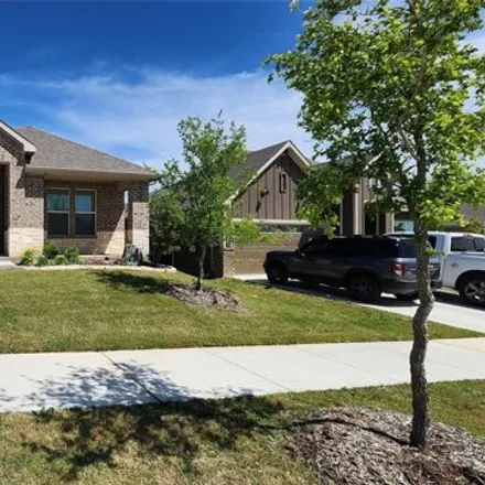 Rent this 4 bed house on Redwing Drive in Denton, TX 76203