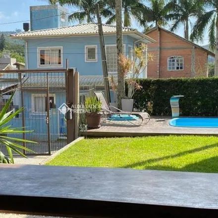 Buy this 3 bed house on Servidão das Borboletas in Lagoa da Conceição, Florianópolis - SC