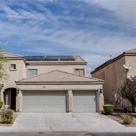 Buy this 4 bed house on 1606 Jake Andrew Avenue in North Las Vegas, NV 89086