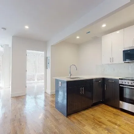 Rent this 2 bed apartment on 138-40 Queens Boulevard in New York, NY 11435