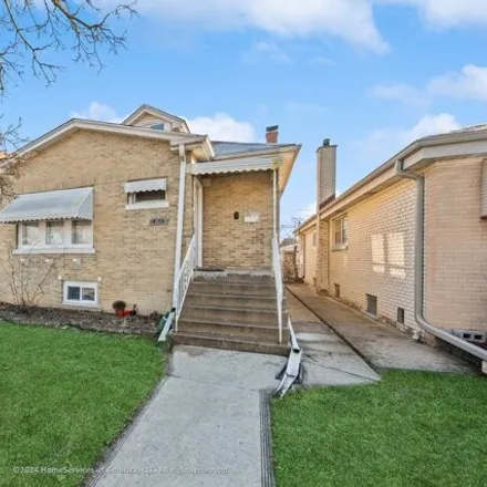 Buy this 4 bed house on 3621 North Overhill Avenue in Chicago, IL 60634