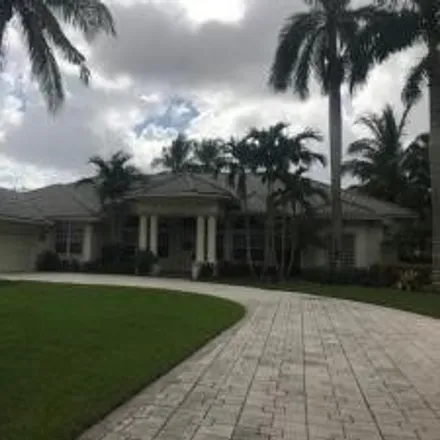 Rent this 6 bed house on 7724 Northwest 47th Drive in Whispering Woods, Coral Springs