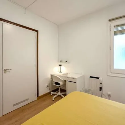 Rent this 7 bed apartment on idk pizza in Carrer del Rosselló, 08001 Barcelona