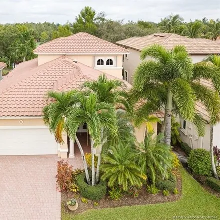 Buy this 3 bed house on Palm Cove Golf & Yacht Club in 2363 Southwest Carriage Hill Terrace, Palm City