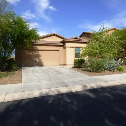 Rent this 3 bed house on 12898 North Sabal Palm Way in Marana, AZ 85653