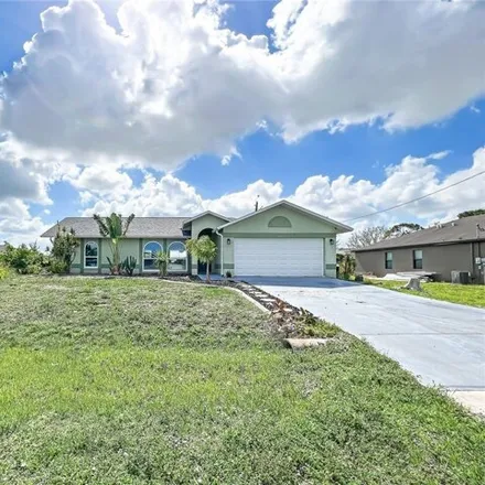 Buy this 3 bed house on 2873 Southwest 18th Place in Cape Coral, FL 33914