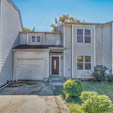 Buy this 3 bed townhouse on 106 Coles Court in City of Glen Cove, NY 11542