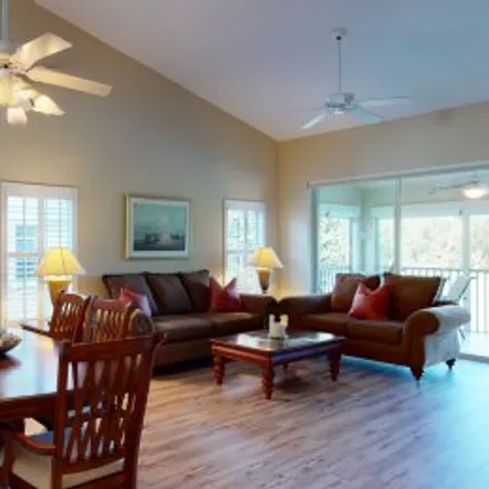 Rent this 2 bed apartment on #402,5689 Heron Lane in Feather Sound at Pelican Strand, Naples