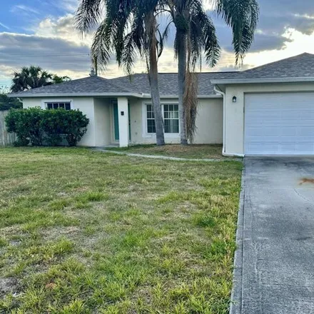 Rent this 3 bed house on 866 Gillen Avenue Northwest in Palm Bay, FL 32907