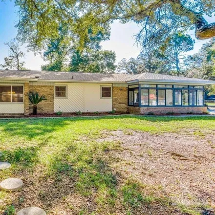 Buy this 3 bed house on 3386 North Blue Angel Parkway in Escambia County, FL 32526