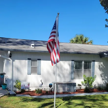 Buy this 2 bed house on 1504 Peachtree Lane in Marion County, FL 34472