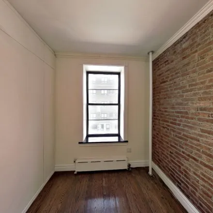Rent this 4 bed apartment on 420 West 51st Street in New York, NY 10019