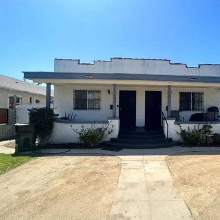 Buy this 4 bed house on 1454 West 53rd Street in Los Angeles, CA 90062