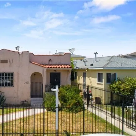 Buy this 5 bed house on 2103 South Burnside Avenue in Los Angeles, CA 90016