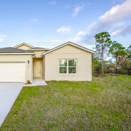 Buy this 4 bed house on 2861 Quentin Avenue Southeast in Palm Bay, FL 32909