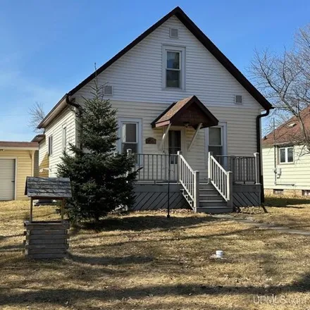 Buy this 3 bed house on 712 Tobin Avenue in Channing, Sagola Township