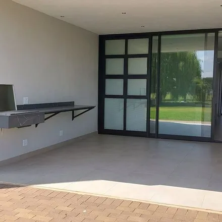 Rent this 3 bed apartment on Lake Drive in Midfield Estate, Gauteng