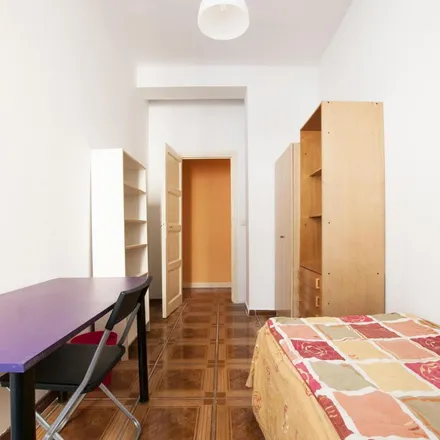 Rent this 9 bed apartment on Madrid in Locutorio, Calle de Miguel Moya