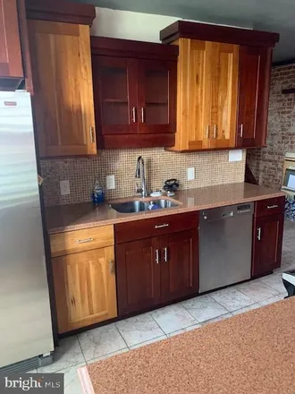 Rent this 2 bed townhouse on East Park Revitalization Alliance Cowboy Garden in 3228 West Montgomery Avenue, Philadelphia