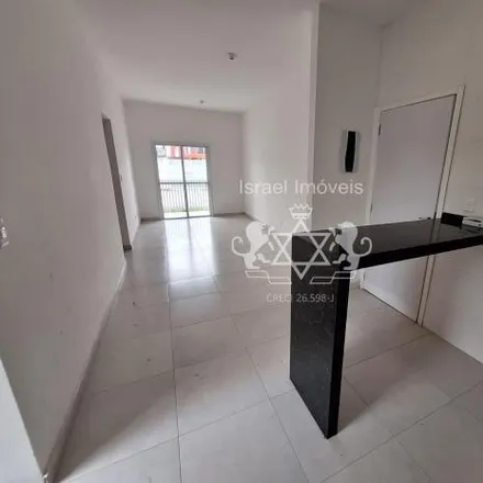 Buy this 2 bed apartment on Rua Jânio da Silva Quadros in Perequê Mirim, Caraguatatuba - SP