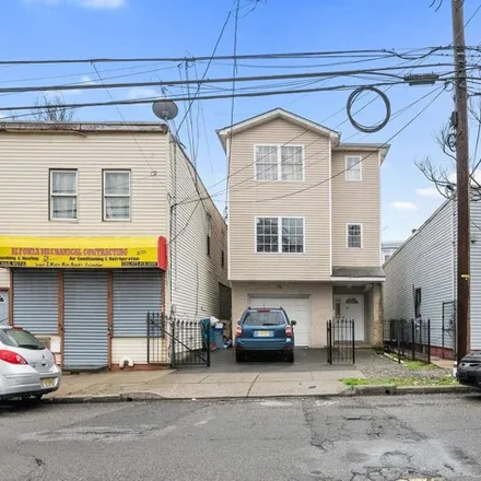 Buy this 12 bed house on 427 15th Avenue in Newark, NJ 07103