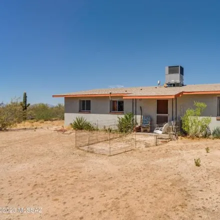Buy this 3 bed house on North Mountain Breeze Drive in Pima County, AZ 85755