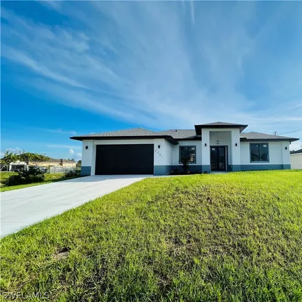 Buy this 3 bed house on 2701 2nd Street Southwest in Lehigh Acres, FL 33976