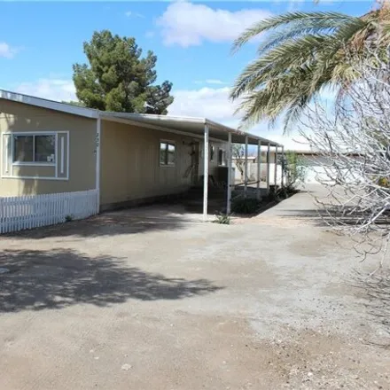 Buy this studio apartment on 242 West Powderhorn Avenue in Moapa Valley, NV 89040
