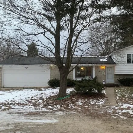 Rent this 3 bed house on Charms Road in Wixom, MI 48381