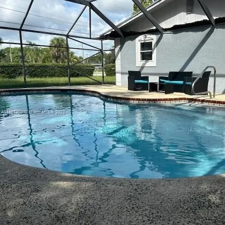 Rent this 3 bed house on Oleander Boulevard in Fort Pierce, FL 34943